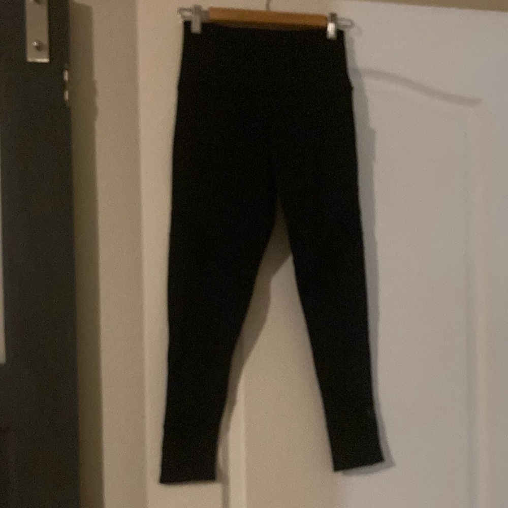 Onzie black legging. Mesh accents on front side.